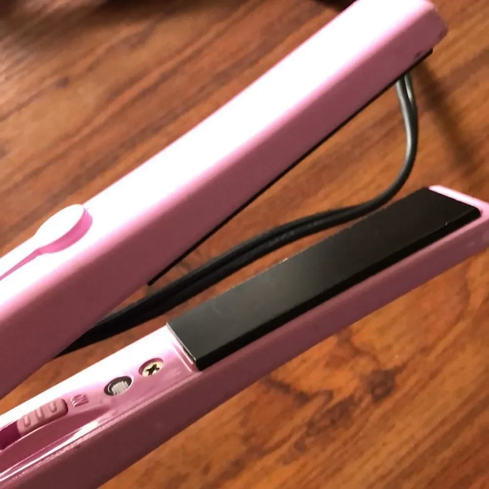 ZOE mini pink flat iron travel iron.